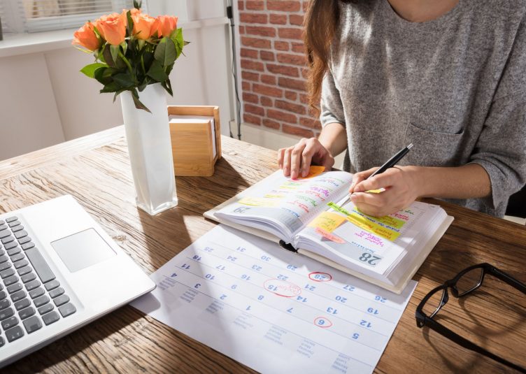 Woman looking over a schedule
