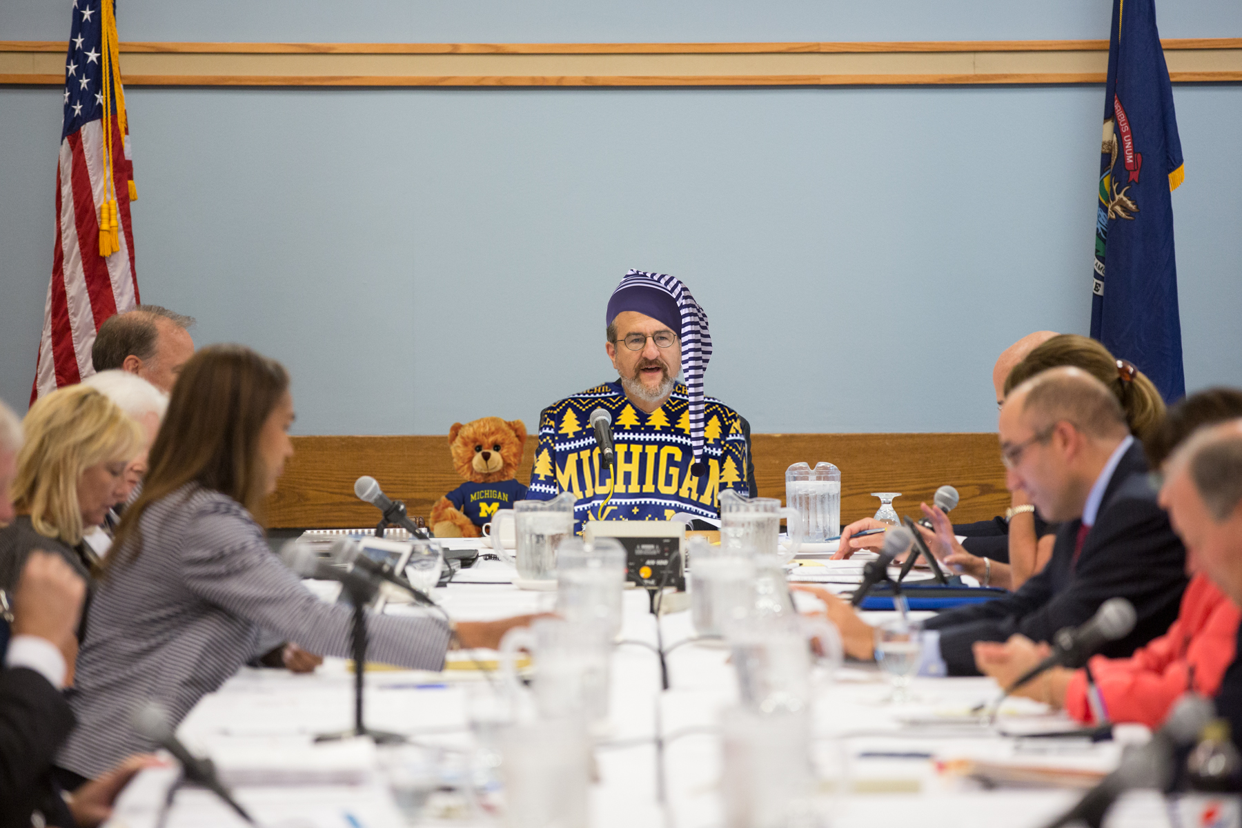 Schlissel at regents meeting dressed in UofM style pajamas