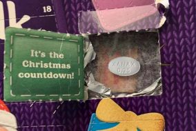 An advent calendar with a Xanax pill inside of it