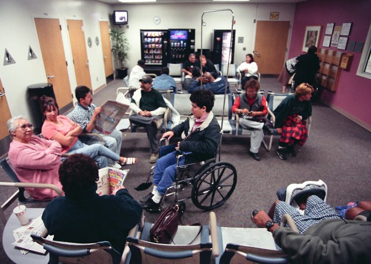 A busy and crowded doctor's office full of patients