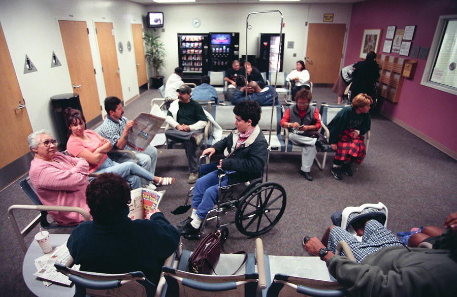A busy and crowded doctor's office full of patients