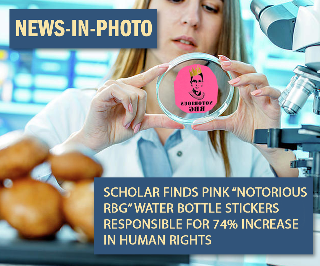 Scientist holding petri dish with sticker