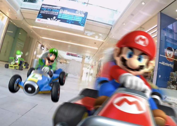 Photoshopped Mario and Luigi driving carts through image of real mall
