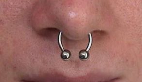 A nose with a septum piercing.
