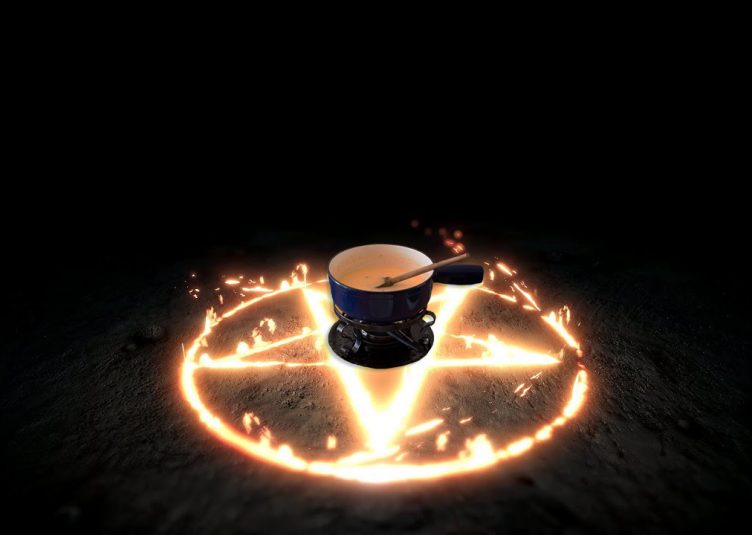 A flaming pentagram with a fondue pot on top of it.