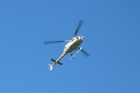 Helicopter hovering overhead