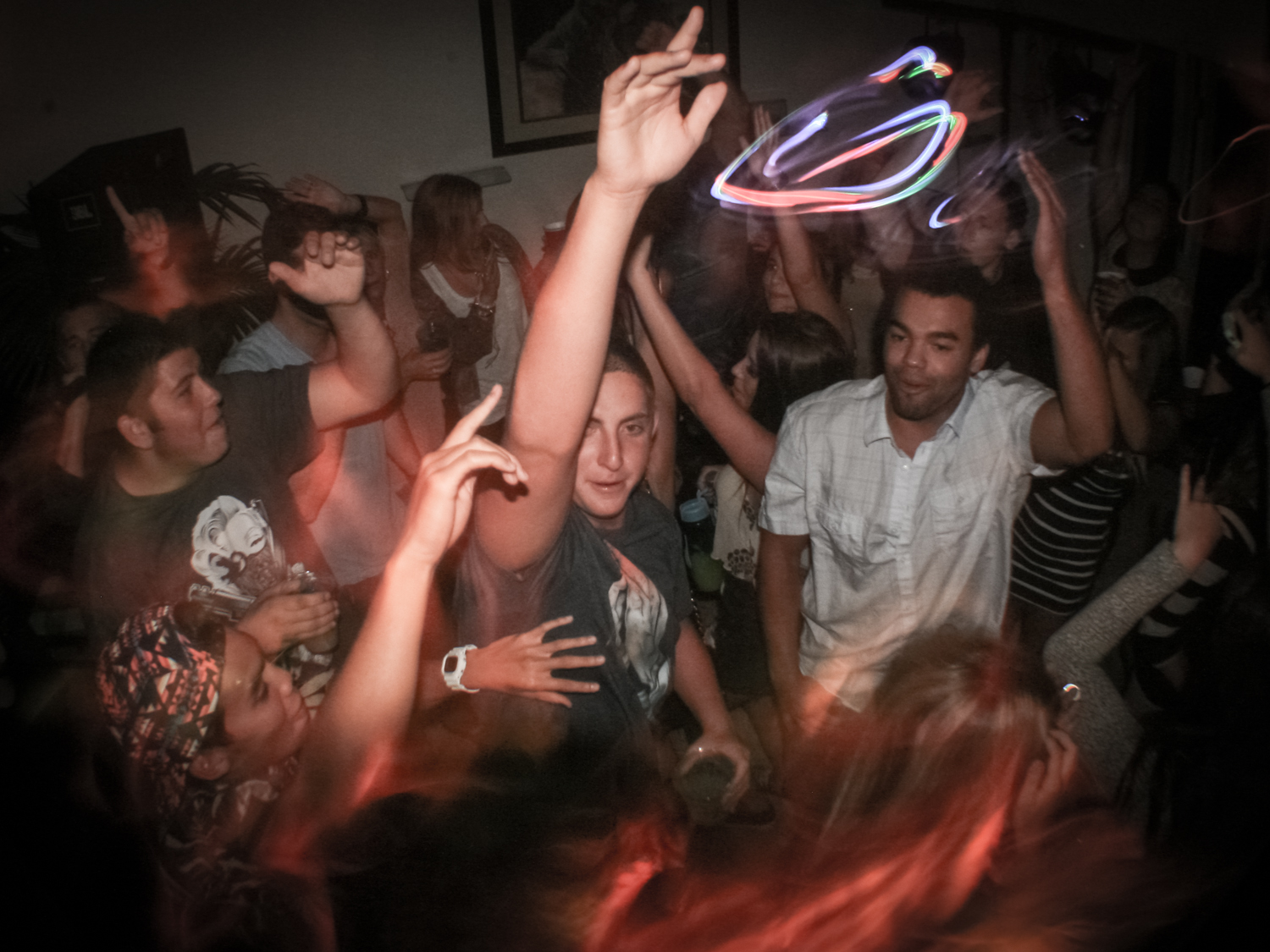 people dancing at a house party