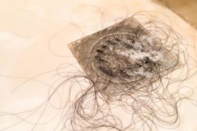Clump of hair around a shower drain