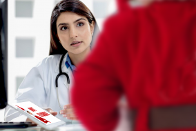 Doctor in a conversation with Santa Claus