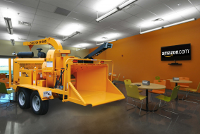 Woodchipper photoshopped inside of corporate lounge