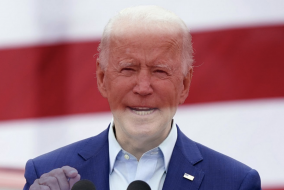 Image of President Biden photoshopped with lower opacity