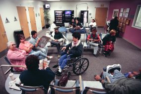A busy and crowded doctor's office full of patients