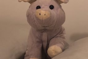 A lavender scented pig that looks in disarray.