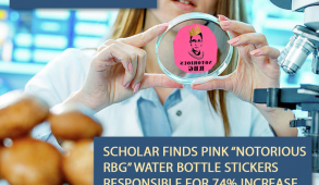 Scientist holding petri dish with sticker