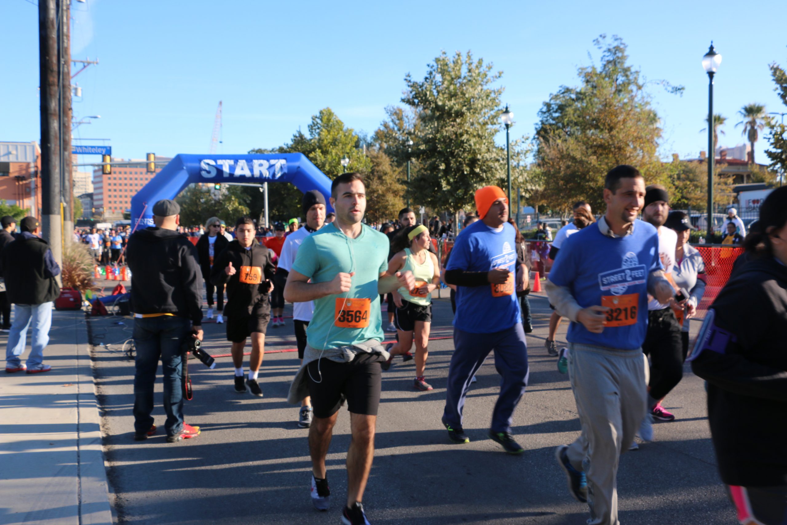 A man running a Thanksgiving 5k.