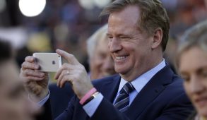 Roger Goodell taking a photo.