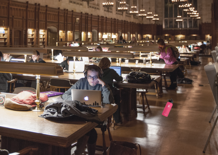 Picture of students studying in the Law Library with a single hydroflask dropped on the floor.