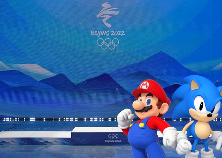 Mario and Sonic standing to the side of the Olympic podium.
