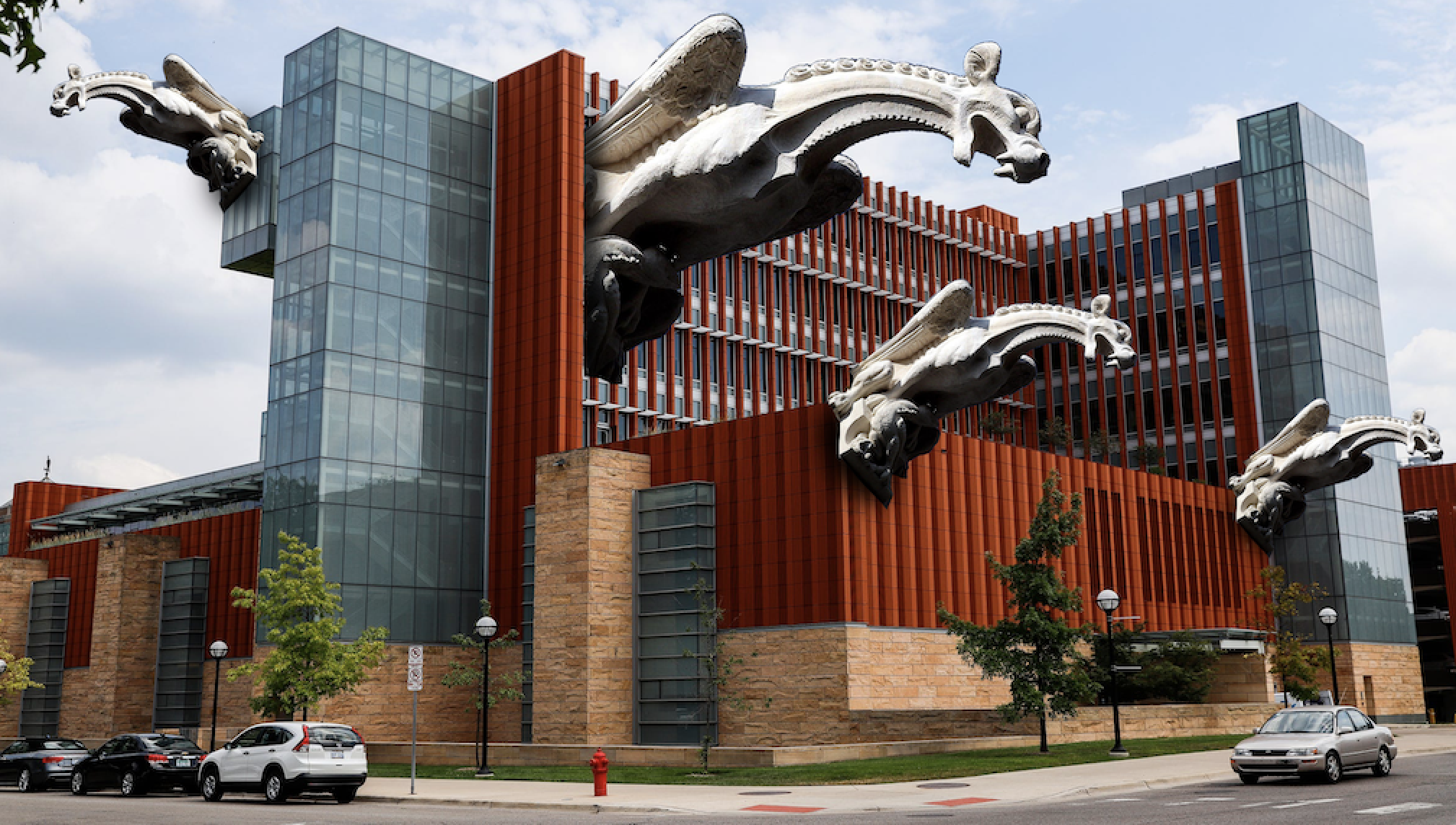 Four gargoyles photoshopped on University of Michigan's Ross School of Business