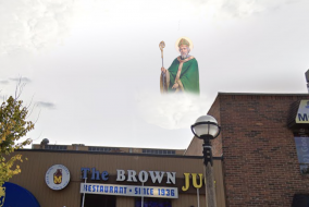 St. Patrick in the sky, looking over the brown jug, and he is pissed.