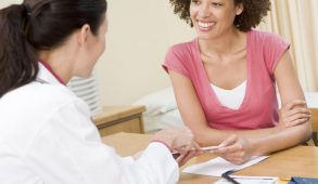 Woman at sperm donation appointment with doctor