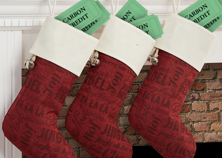 Three stockings with carbon credits sticking out
